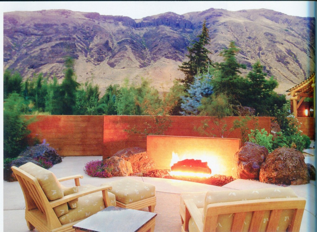 Fire pit Not sure that we like the ground outside firepit (fireplace might be better), but we do like the low wall that frames the outside view.